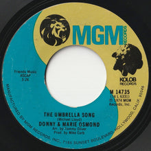 Load image into Gallery viewer, Donny & Marie Osmond - I'm Leaving It (All) Up To You / The Umbrella Song (7 inch Record / Used)