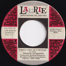 Load image into Gallery viewer, Royal Guardsmen - Snoopy&#39;s Christmas / It Kinda Looks Like Christmas (7 inch Record / Used)
