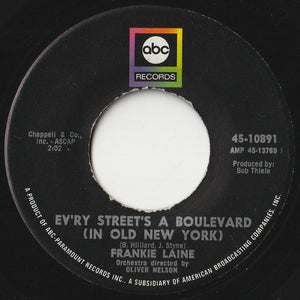 Frankie Laine - I'll Take Care Of Your Cares / Ev'ry Street's A Boulevard (In Old New York) (7 inch Record / Used)